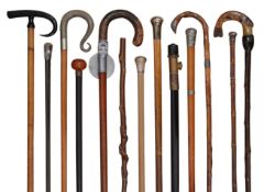A collection of Edwardian and later walking canes and sticks