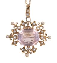 An Edwardian pink topaz and seed pearl brooch/pendant