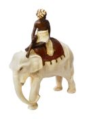 A painted composition figure of an elephant and mahout