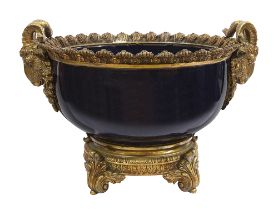 A French Louis XVI style ormolu mounted blue glass jardiniere