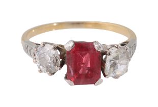 A spinel and diamond three stone ring