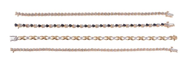 A group of four 9ct gold gem set bracelets
