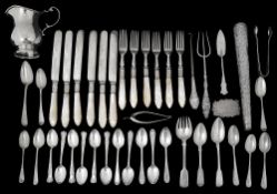 A collection of silver to include a cream jug and teaspoons