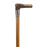 An early 20th century novelty carved antler walking cane