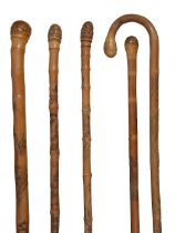Five Japanese Meiji period bamboo walking sticks c.1900