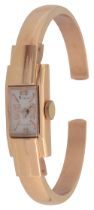 An 18ct gold Ralco manual wind bangle lady's wristwatch