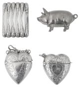 Three late Victorian and Edwardian novelty silver vesta cases