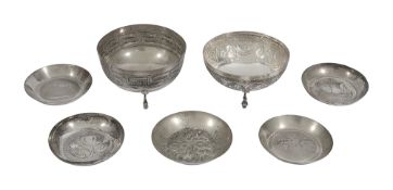 Two Cypriot silver bowls and five pin dishes