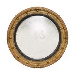 A Regency gilt gesso convex mirror c.1820