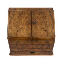 A Victorian walnut and figured walnut stationery cabinet