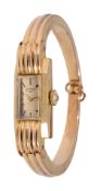 A 1950s lady's 9ct gold Rotary manual wind bangle wristwatch