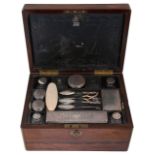 A William IV rosewood travelling toilet box with silver mounted fittings