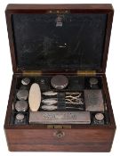 A William IV rosewood travelling toilet box with silver mounted fittings