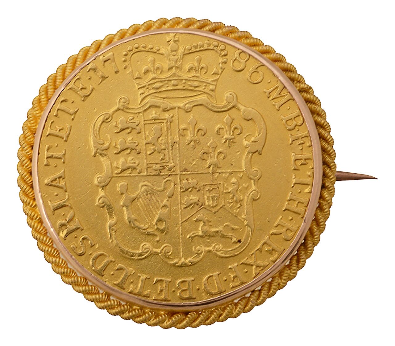 A George III Guinea brooch, dated 1786