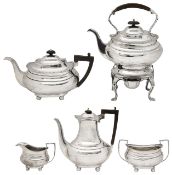 An Edwardian matched silver tea and coffee service + a plated spirit kettle