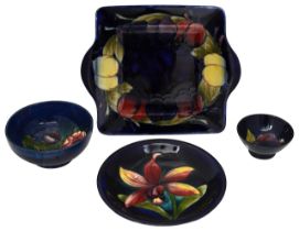 Four pieces of Moorcroft pottery