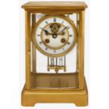 A late 19th century French four glass gilt brass mantle clock