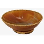 Boucheron. Paris. A small gold mounted banded russet agate dish