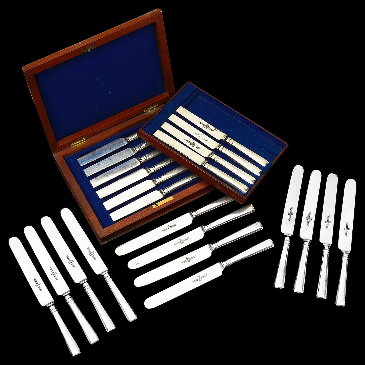 A set of late Victorian electroplated table and dessert knives