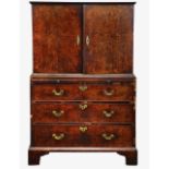 A George I burr walnut cabinet on chest