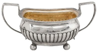 A late George III silver twin handled sugar basin