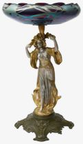 An Austrian Art Nouveau cold painted spelter and glass figural