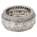 An impressive triple full hoop diamond-set eternity ring