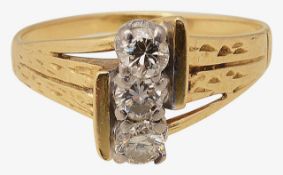 An 18ct gold and diamond three stone ring