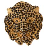 A lion's head brooch by Chanel