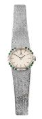 A lady's Omega wrist watch with diamond and emerald bezel