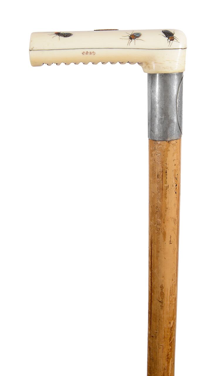 A Japanese shibayama ivory handled malacca walking stick