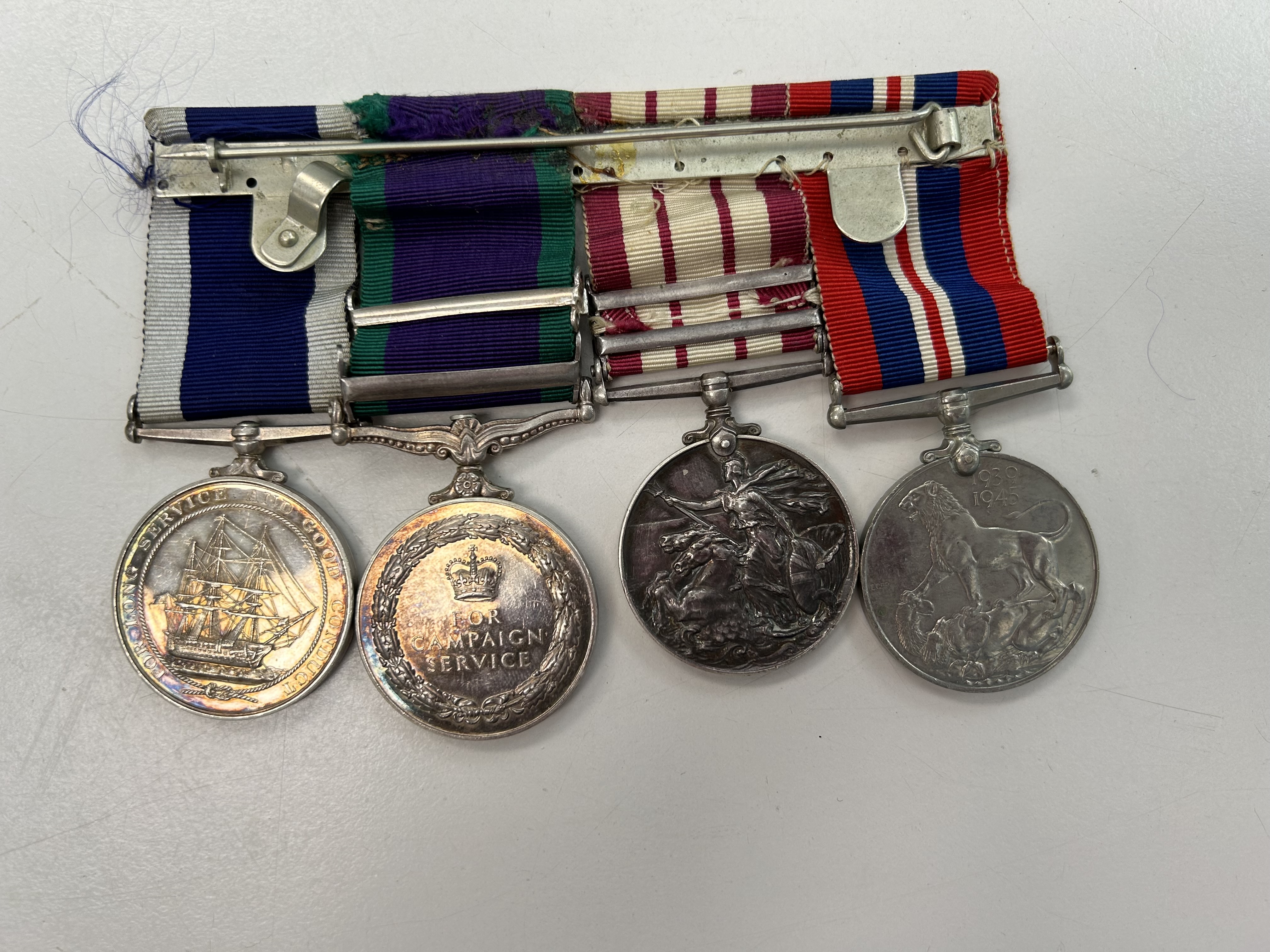 A four medal group awarded to Marine F.E Matthews, Royal Marines - Image 3 of 10