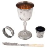An Elizabeth II silver goblet and other silver