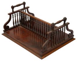 A George IV rosewood double sided desk top book tray