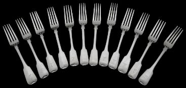 A matched set of twelve silver fiddle pattern table forks