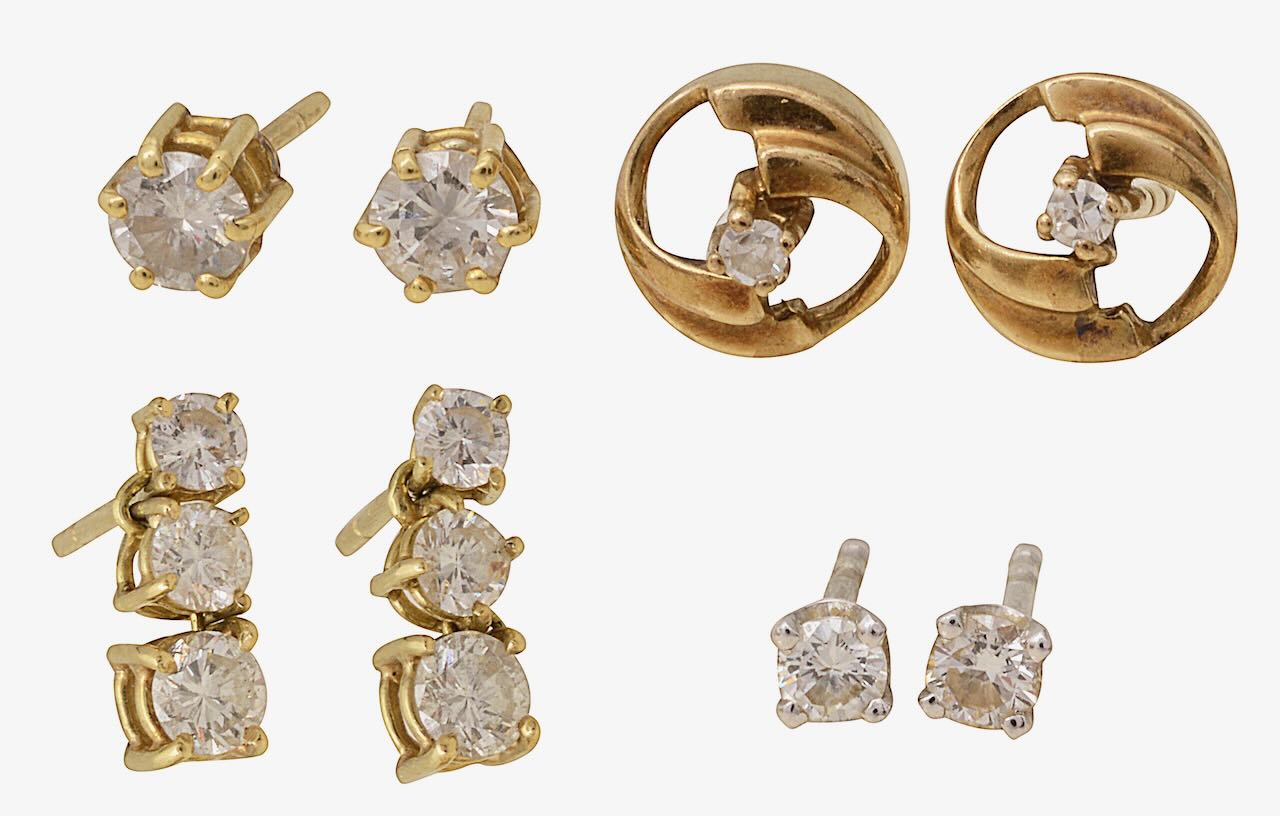 A collection of diamond set earrings