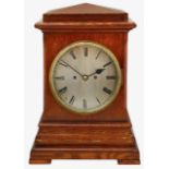 A late Victorian oak cased bracket clock