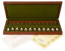 An Elizabeth II cased set of twelve silver RHS Flower spoons'