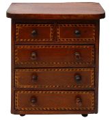 An early Victorian mahogany apprentice chest barbers pole