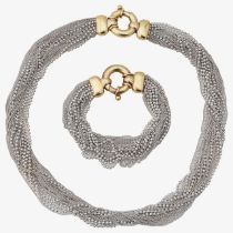 A silver multi-strand matching necklace and bracelet retailed by Mappin & Webb