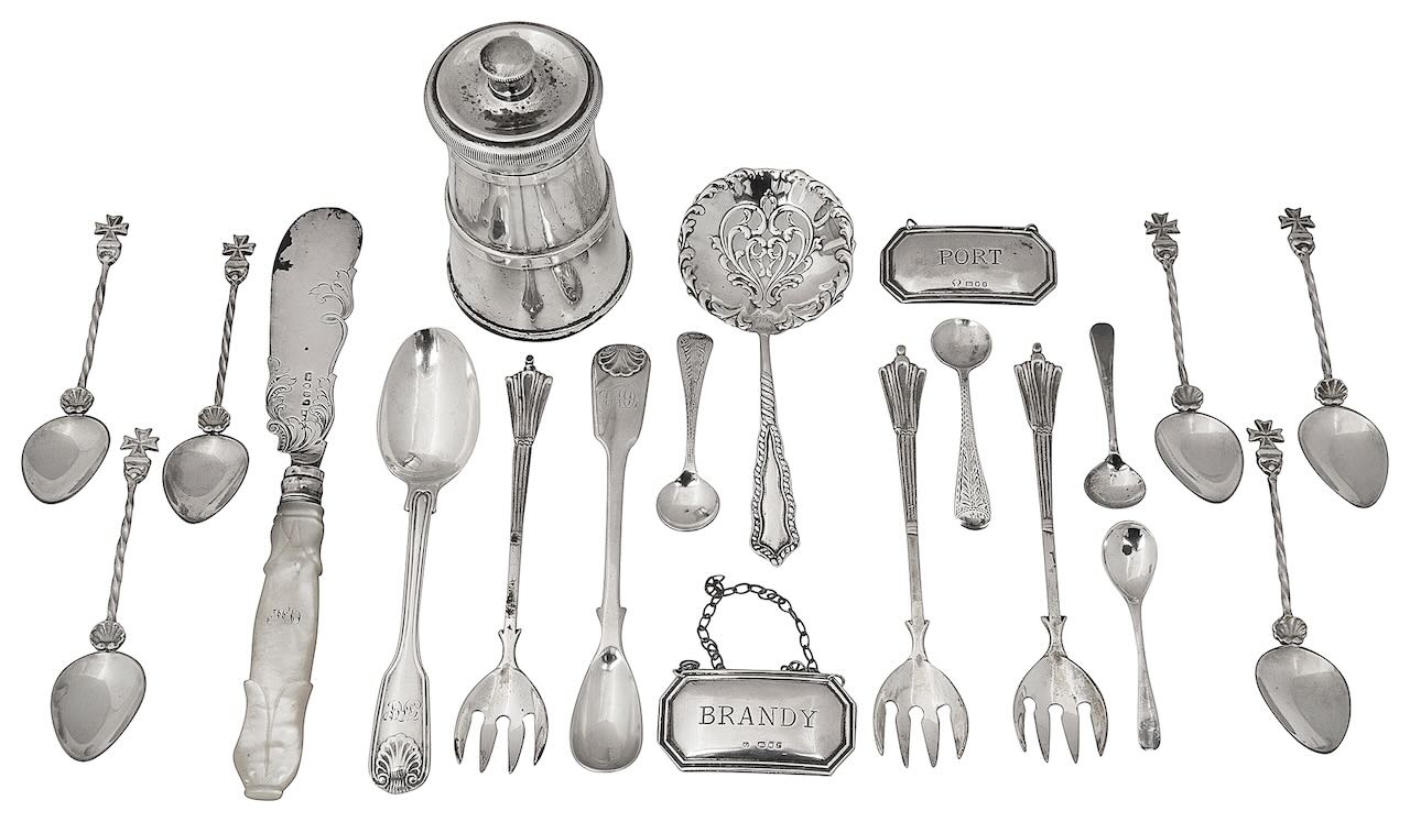 An Elizabeth II silver pepper mill and other silver