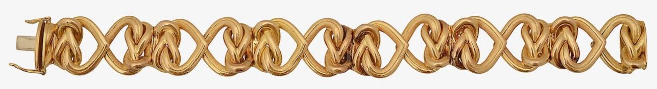 An attractive 18ct gold heart link bracelet by Garrard