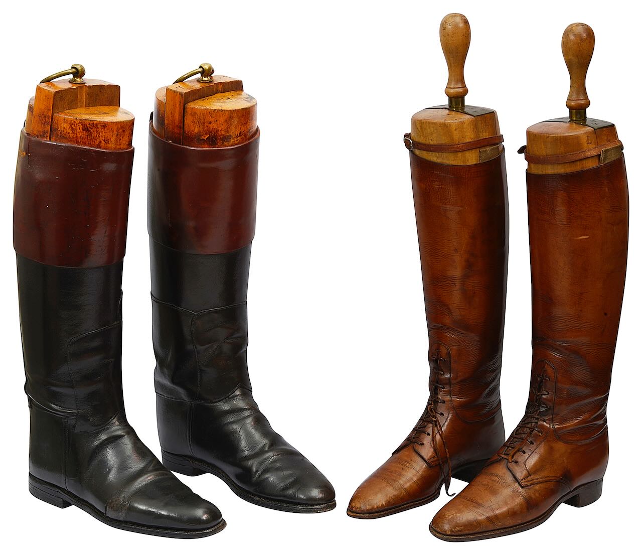 Two pairs of early 20th century leather hunting boots with trees