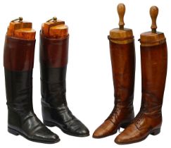 Two pairs of early 20th century leather hunting boots with trees