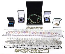 A collection of silver and costume jewellery