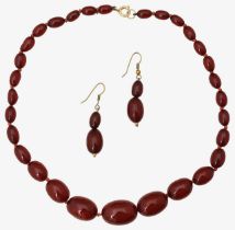 A cherry amber necklace & matching earrings