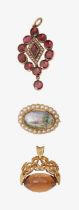 A 19th flat cut garnet, seed pearl pendant and a fob