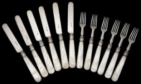 A Victorian set of six mother of pearl handled silver fruit knives and forks