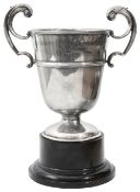 A silver twin handled trophy cup