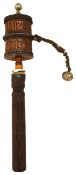 A Tibetan silver mounted brass Bhuddist hand prayer wheel (mani)